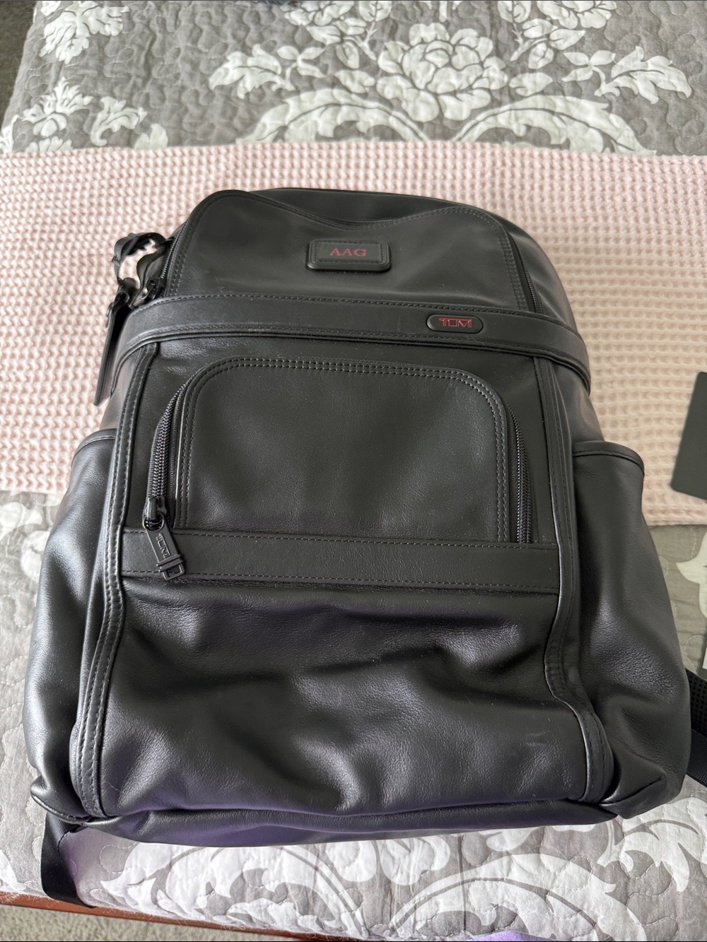 Tumi Black Leather Men’s Backpack with Front Zip Pocket